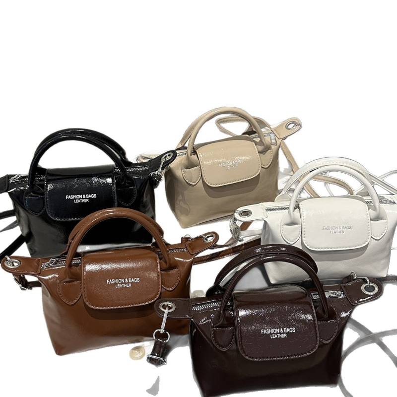 Crossbody Dumpling torbica - PU materijal, zatvaranje zipom, uspravni kvadratni oblik, jedna naramenica, unutarnja džep sa zipom (Autumn 2025)