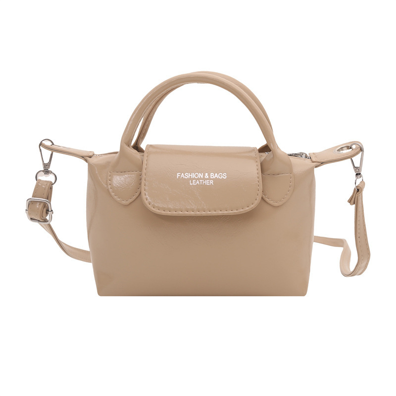 Crossbody Dumpling torbica - PU materijal, zatvaranje zipom, uspravni kvadratni oblik, jedna naramenica, unutarnja džep sa zipom (Autumn 2025)