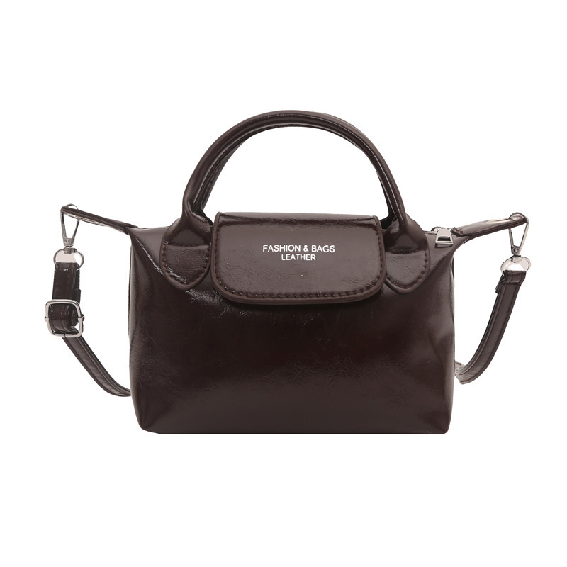 Crossbody Dumpling torbica - PU materijal, zatvaranje zipom, uspravni kvadratni oblik, jedna naramenica, unutarnja džep sa zipom (Autumn 2025)