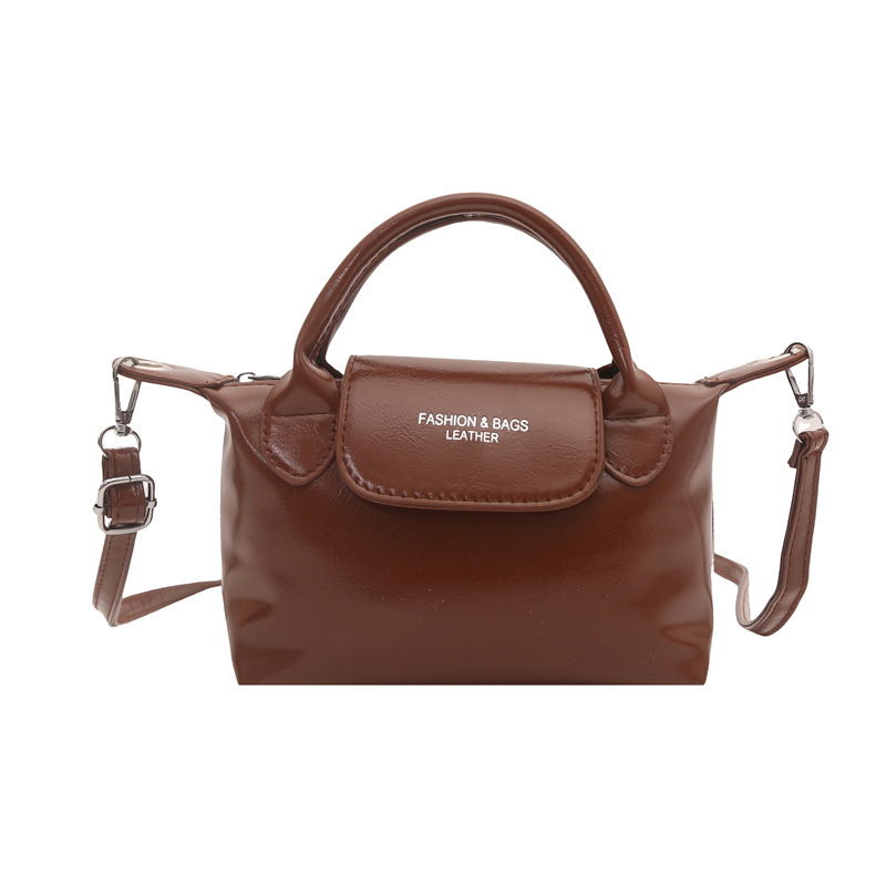 Crossbody Dumpling torbica - PU materijal, zatvaranje zipom, uspravni kvadratni oblik, jedna naramenica, unutarnja džep sa zipom (Autumn 2025)