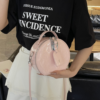 Ženska kružna crossbody torba — gradski minimalistički stil, PU materijal, zatvarač, džep za telefon