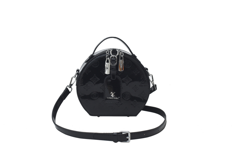 Ženska kružna crossbody torba — gradski minimalistički stil, PU materijal, zatvarač, džep za telefon