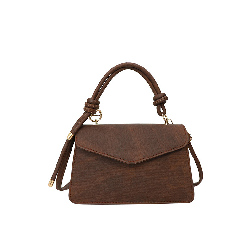 Crossbody torba, mala kvadratnog oblika, PU materijal, magnetsko zatvaranje, unutarnja zip pretinac, urban minimalistički stil