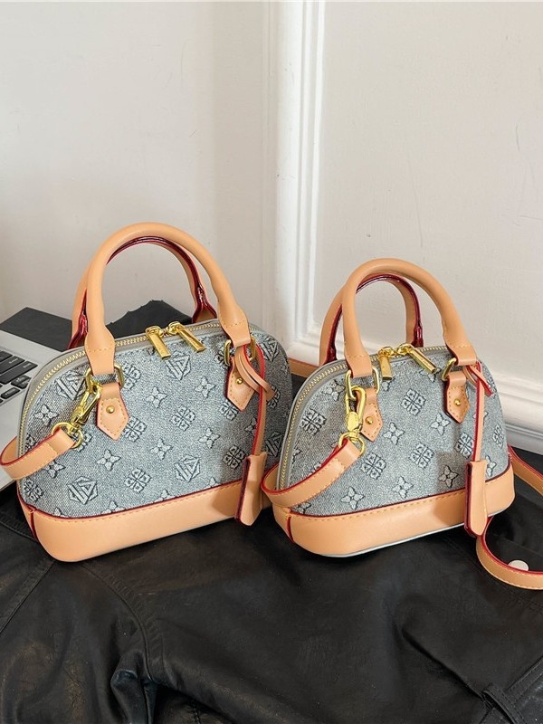 Ženska torba u obliku školjke — PU materijal, zatvaranje na zip, jedna naramenica, unutarnja pretinica za mobitel