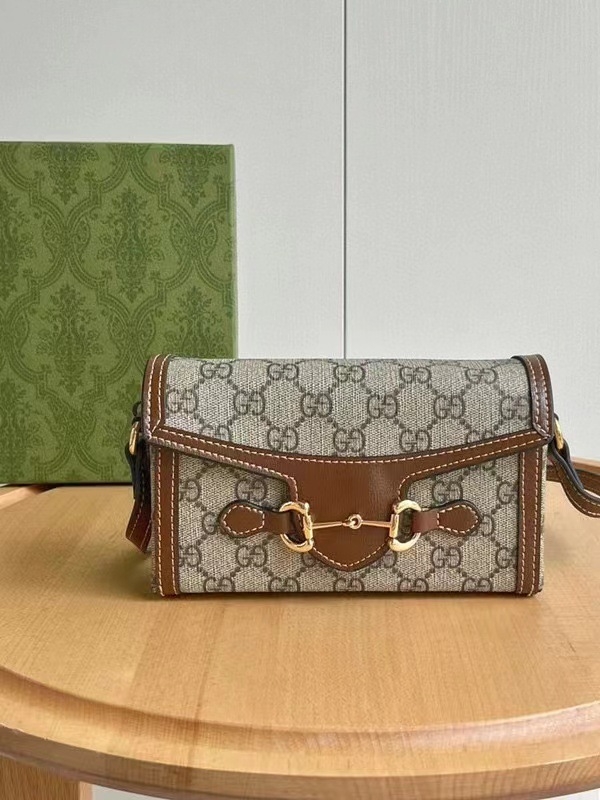 1955 Prava kožna box torba, gradski stil, vodoravni kvadratni oblik, zatvaranje poklopcem, unutarnje pretince za telefon i dokumente