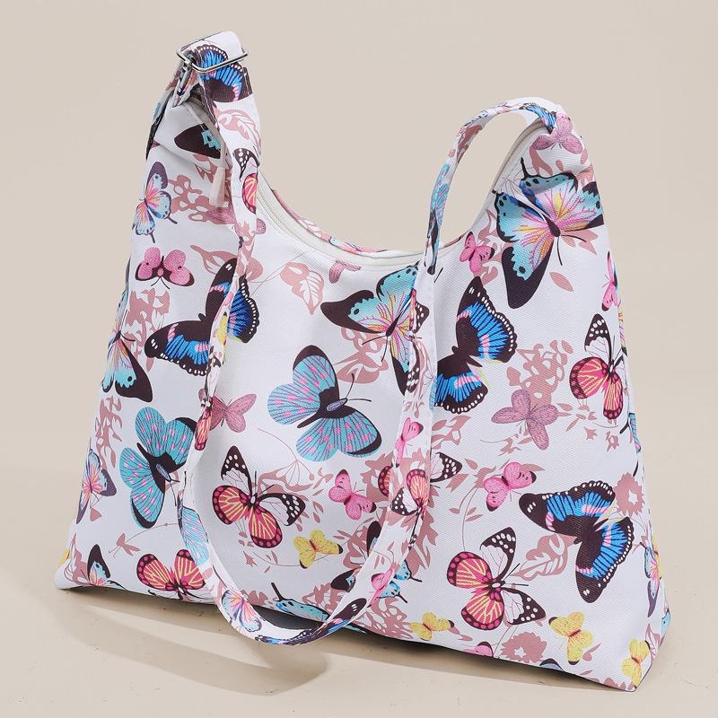 Τσάντα ώμου, σε αστικό μινιμαλιστικό στυλ από νάιλον, σχήματος dumpling, με φερμουάρ και εσωτερικό θήκη