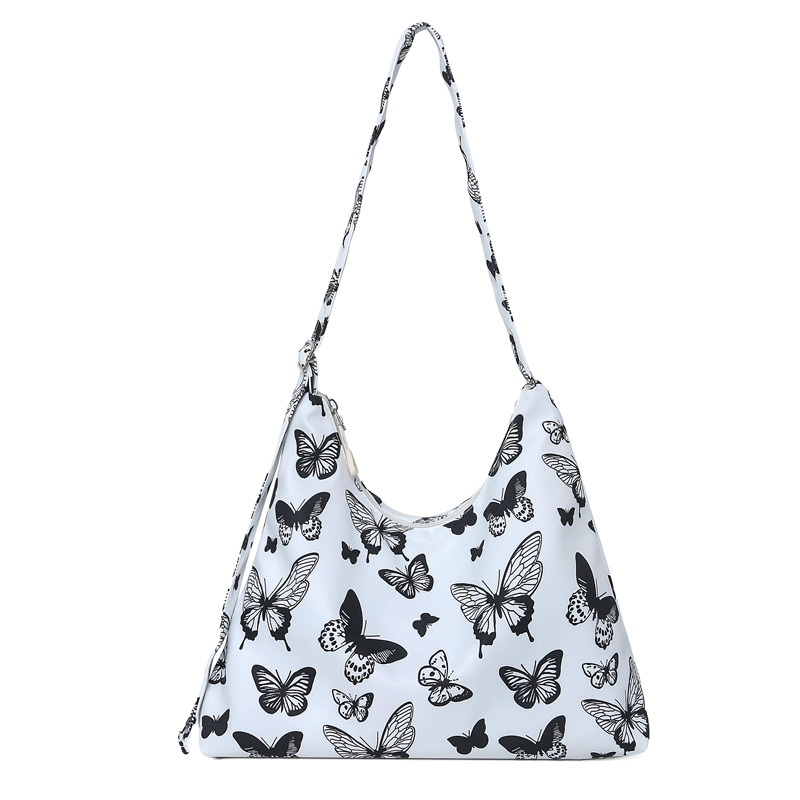 Τσάντα ώμου, σε αστικό μινιμαλιστικό στυλ από νάιλον, σχήματος dumpling, με φερμουάρ και εσωτερικό θήκη