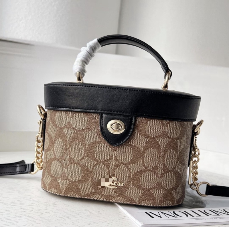 Monogram doboz táska hengeres formával, PVC anyag, záras nyitás, belső zseb telefon számára, egy vállpánt