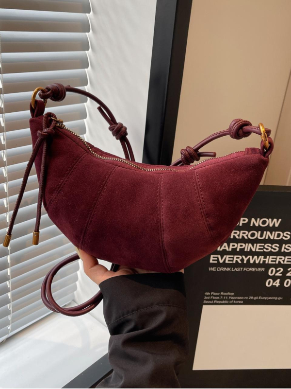 Dumpling alakú crossbody táska PU anyagból, cipzáras nyitás, belső telefontartó, poliészter bélés, egyszemélyes vállpánt (PU; dumpling forma; cipzár; telefontartó; poliészter)