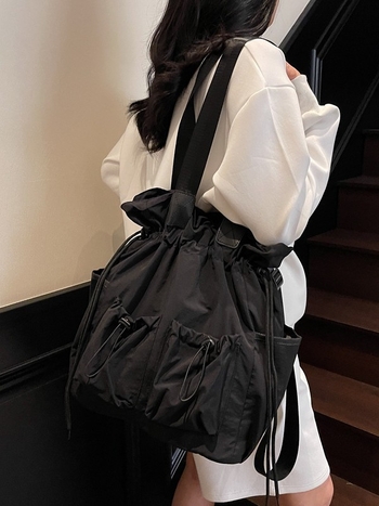 Najlon dama torba, tip kofera s naborima, zatvaranje šnuralom, unutarnji džepovi, dvostruke naramenice