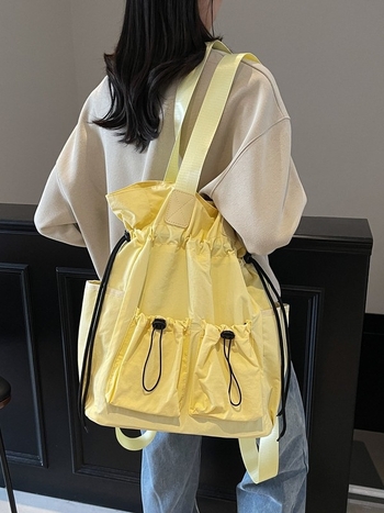 Najlon dama torba, tip kofera s naborima, zatvaranje šnuralom, unutarnji džepovi, dvostruke naramenice