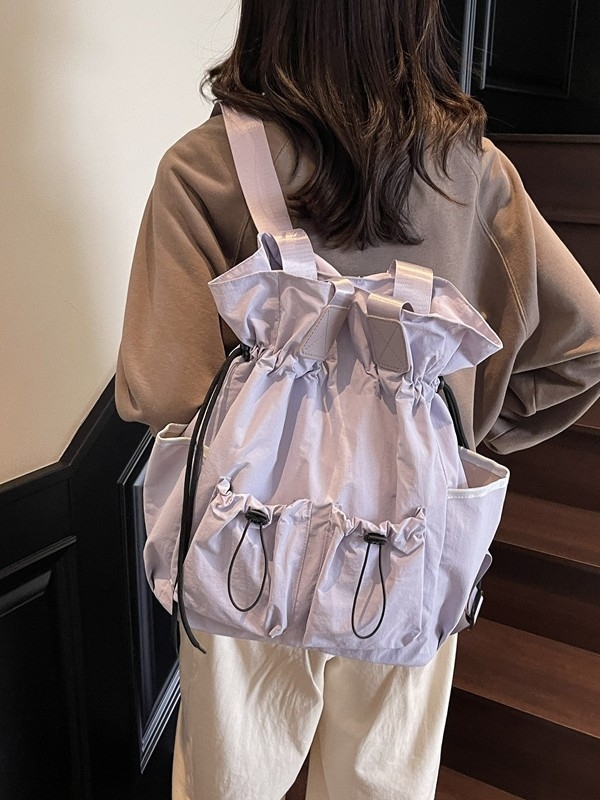 Najlon dama torba, tip kofera s naborima, zatvaranje šnuralom, unutarnji džepovi, dvostruke naramenice