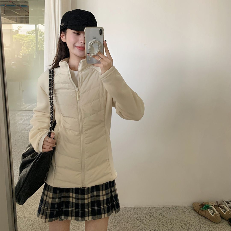 Ženska down jakna, debeli model, ultra kratka dužina, punilo od kačjih perja 81–85%, stojeći ovratnik, elastični materijal