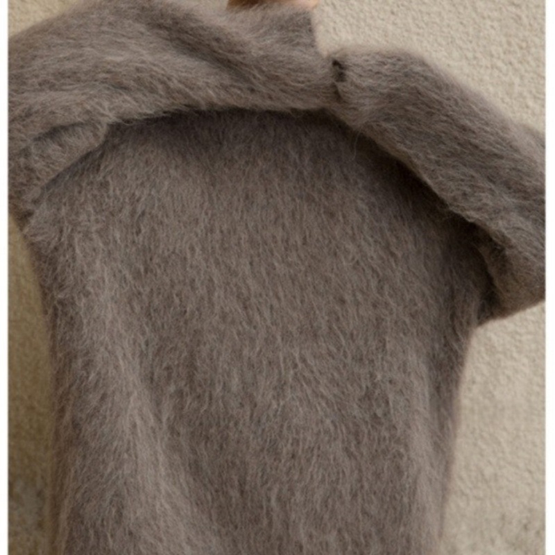 Ženski pulover od akrilne smjese, opuštenog kroja, okrugli izrez, duljina 50-65 cm, elegantan gradski stil.