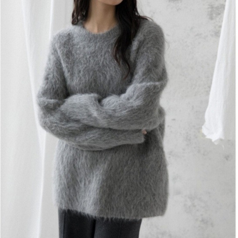 Ženski pulover od akrilne smjese, opuštenog kroja, okrugli izrez, duljina 50-65 cm, elegantan gradski stil.