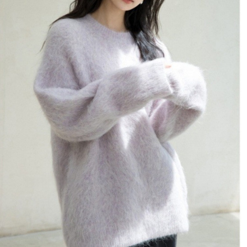Ženski pulover od akrilne smjese, opuštenog kroja, okrugli izrez, duljina 50-65 cm, elegantan gradski stil.