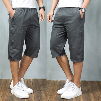 Férfi nyári pamut capri nadrágok sok zsebbel, laza szabás, rövid, alacsony derék, zsinóros zárás