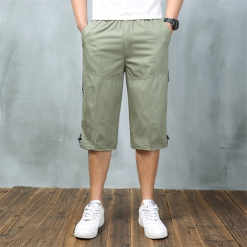 Férfi nyári pamut capri nadrágok sok zsebbel, laza szabás, rövid, alacsony derék, zsinóros zárás