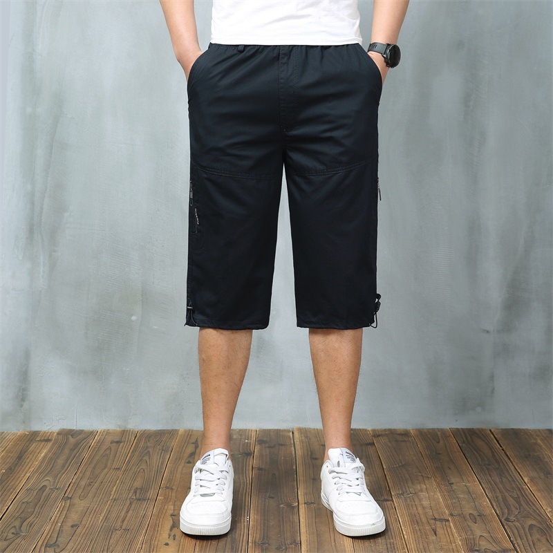 Férfi nyári pamut capri nadrágok sok zsebbel, laza szabás, rövid, alacsony derék, zsinóros zárás
