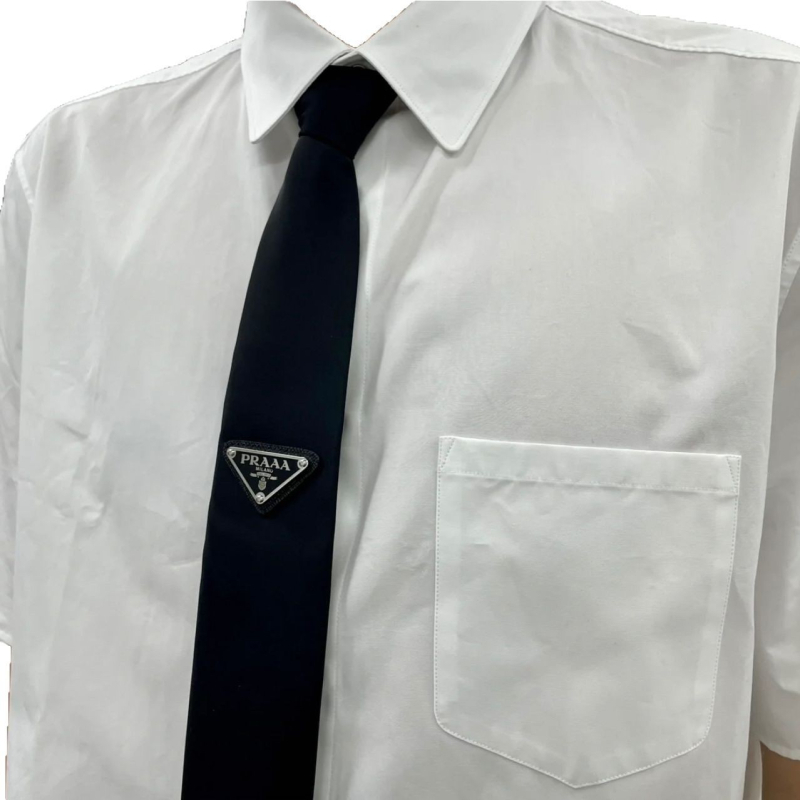Kravata – oblik strelice, ležerni stil, monokromatski uzorak, unisex.