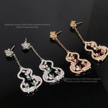 Обеци Jubilee Jewelry — златно покрити, капковидна геометрия, пролет 2025