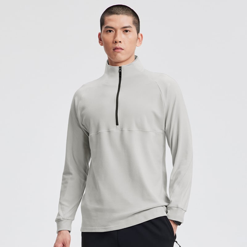 Férfi fél-zip sportos felső, hosszú ujjú, állálló gallérral, szoros szabású poliészter anyagból, téli–tavaszi–őszi viselet