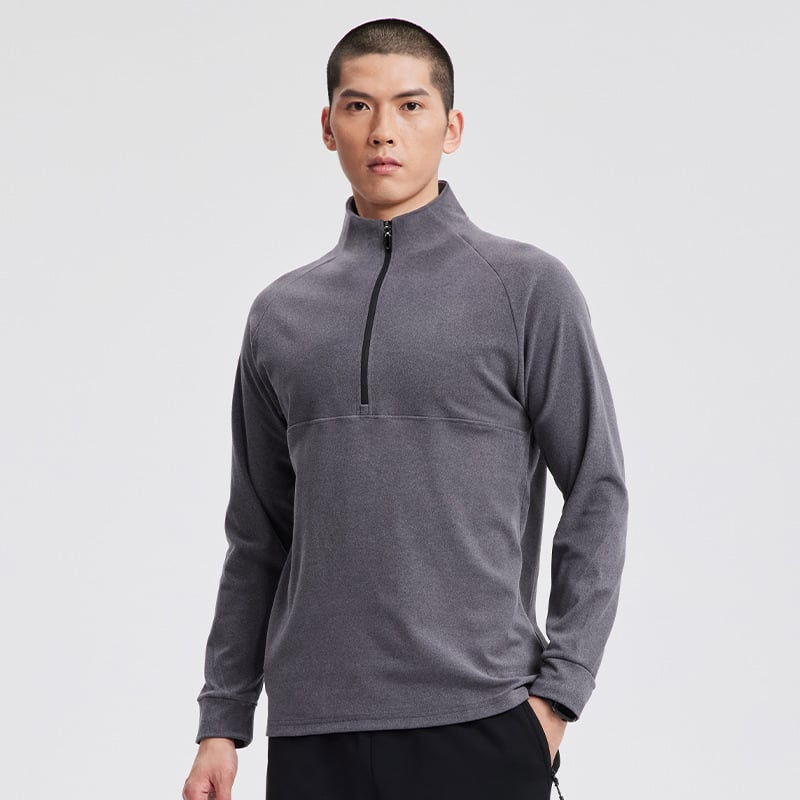 Férfi fél-zip sportos felső, hosszú ujjú, állálló gallérral, szoros szabású poliészter anyagból, téli–tavaszi–őszi viselet