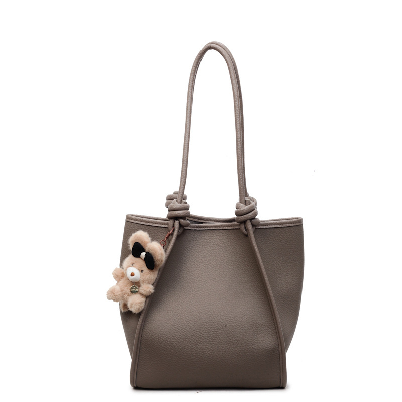 PU ženska bucket torba, vertikalni kvadratni oblik, magnetska kopča, unutarnja pretinica za telefon, jesen 2025 izdanje