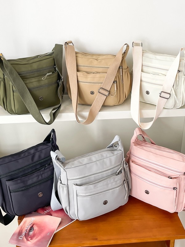 Ženska nylon torbica crossbody, horizontalnog kvadratnog oblika, otvaranje na zip, džep sa zipom, poliester podstava