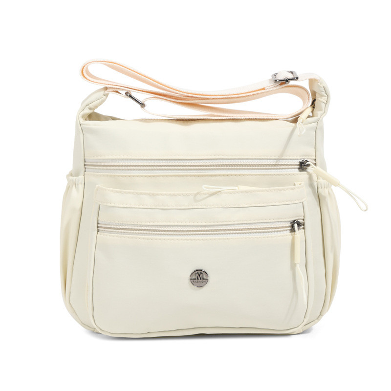 Ženska nylon torbica crossbody, horizontalnog kvadratnog oblika, otvaranje na zip, džep sa zipom, poliester podstava