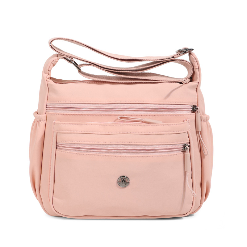 Ženska nylon torbica crossbody, horizontalnog kvadratnog oblika, otvaranje na zip, džep sa zipom, poliester podstava