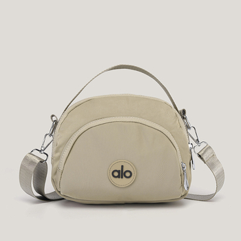 Ženska mala okrugla crossbody torbica — platno, unutarnji džepovi za telefon, dokumente i džep s zatvaračem, podstava od poliestera