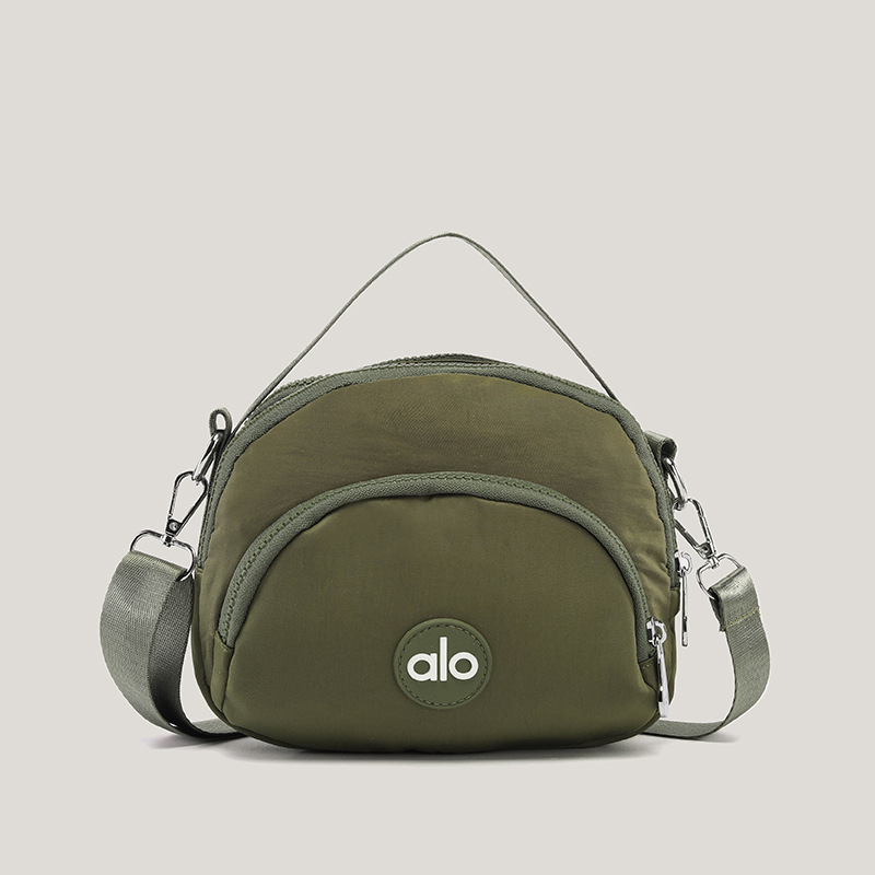 Ženska mala okrugla crossbody torbica — platno, unutarnji džepovi za telefon, dokumente i džep s zatvaračem, podstava od poliestera