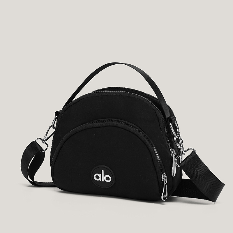 Ženska mala okrugla crossbody torbica — platno, unutarnji džepovi za telefon, dokumente i džep s zatvaračem, podstava od poliestera