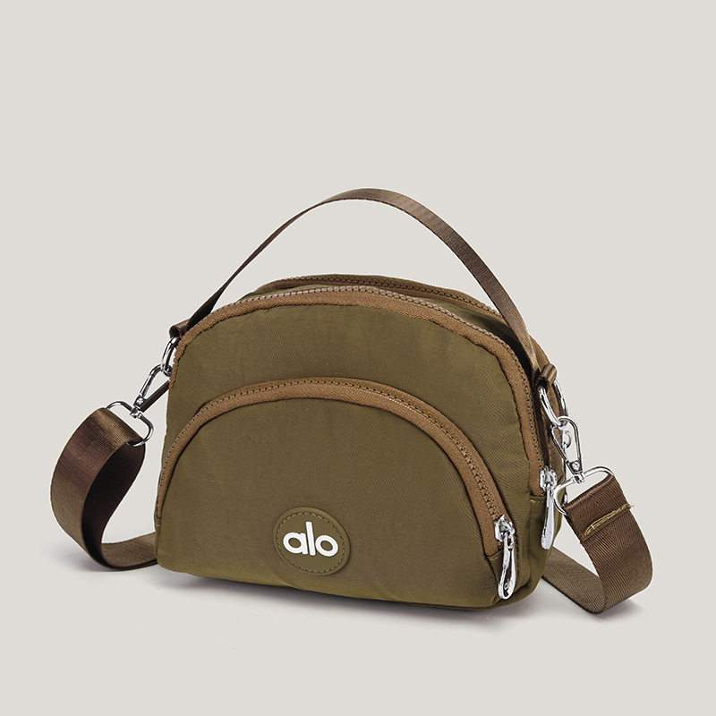 Ženska mala okrugla crossbody torbica — platno, unutarnji džepovi za telefon, dokumente i džep s zatvaračem, podstava od poliestera