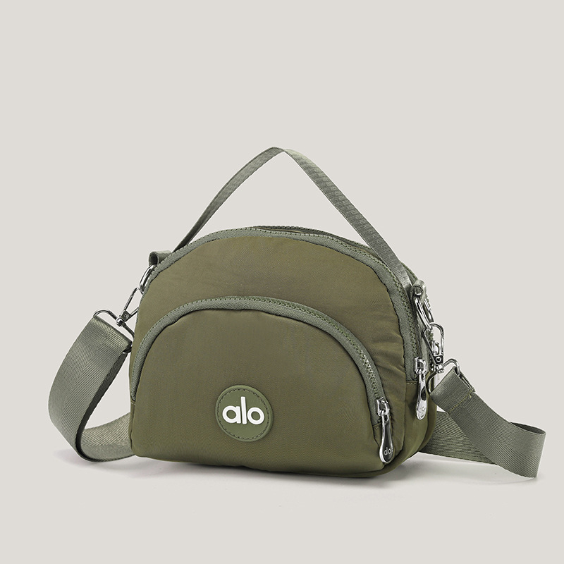 Ženska mala okrugla crossbody torbica — platno, unutarnji džepovi za telefon, dokumente i džep s zatvaračem, podstava od poliestera