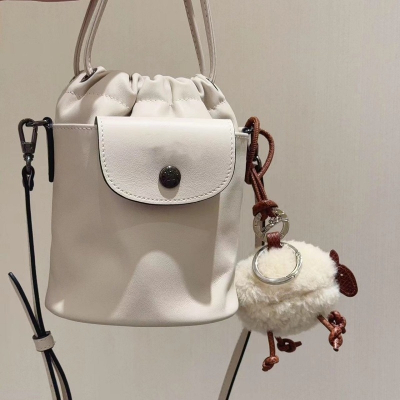 Kanta torba s vrpčanim zatvaranjem, PU koža, cilindričnog oblika, gradski stil, unutarnji džepovi za telefon i dokumente