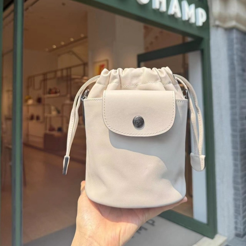 Kanta torba s vrpčanim zatvaranjem, PU koža, cilindričnog oblika, gradski stil, unutarnji džepovi za telefon i dokumente