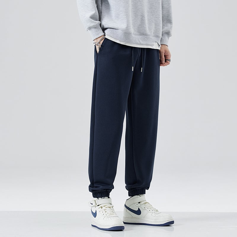 Férfi melegítő nadrág fleece béléssel, vastagított, lazább szabás, húzózsinórral, 63% pamut / 37% poliészter