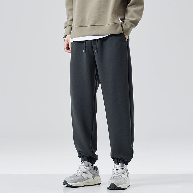 Férfi melegítő nadrág fleece béléssel, vastagított, lazább szabás, húzózsinórral, 63% pamut / 37% poliészter