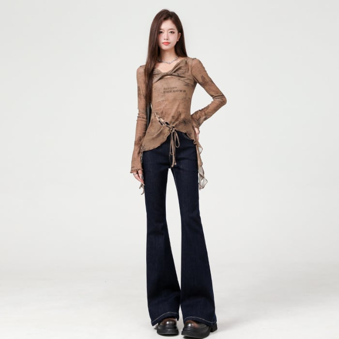 Traperice visokog struka, blago širećeg kroja, oprane, 70–80% pamuka, japansko-korejski casual stil