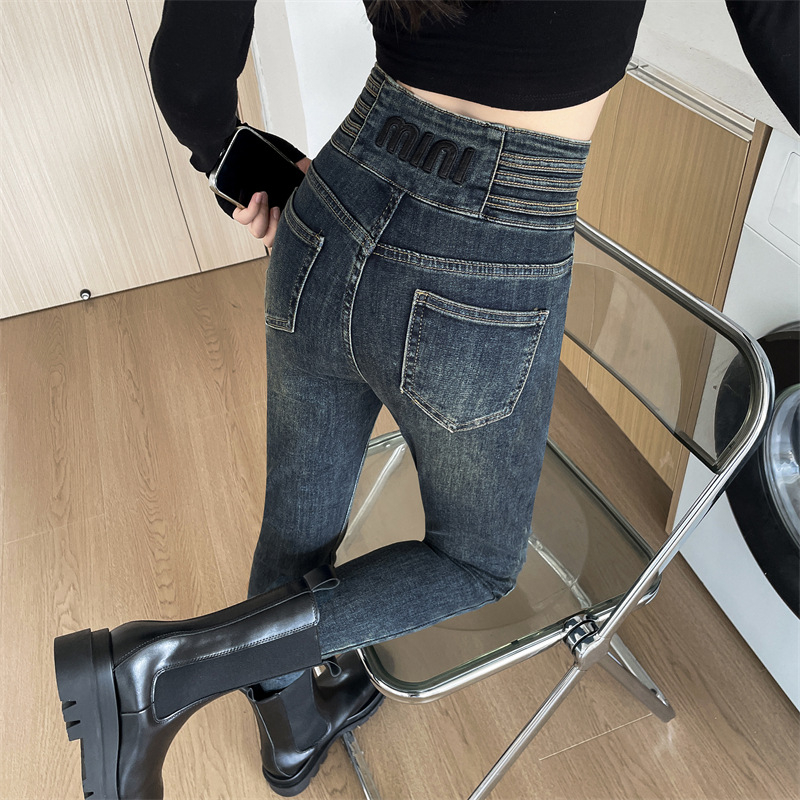 Ženske farmerice s flis podstavom, debeli, visoki struk, uski kroj, pamuk-elastan denim