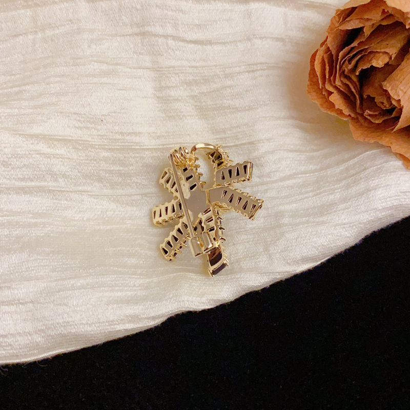 Ženska broš s mašnicom od bakra, cirkon mikro-pavé, pozlata pravim zlatom