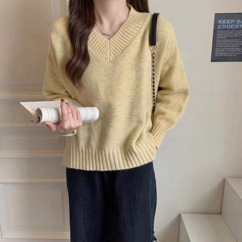 Pulover lejer cu decolteu în V, croială relaxată, mâneci lungi, culoare solidă, poliester, grosime medie, lungime 50–65 cm, lansare vară 2025