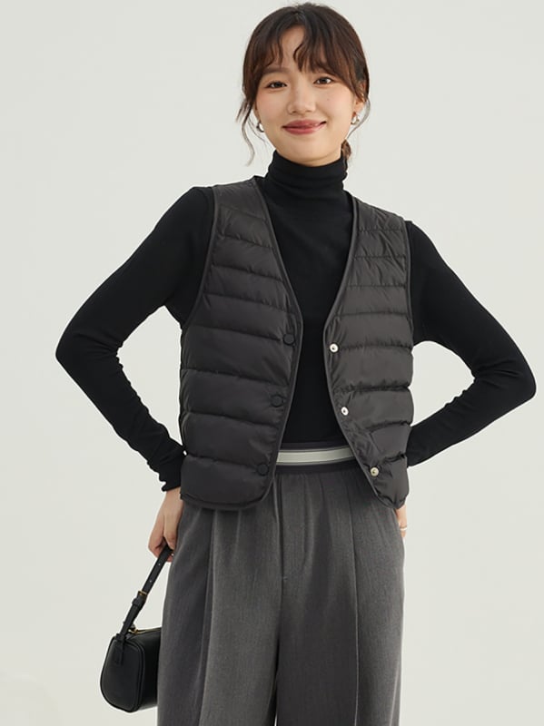 Ženski down vest, 86–90% perja, punilo: gusje perje, poliester tkanina, V-izrez