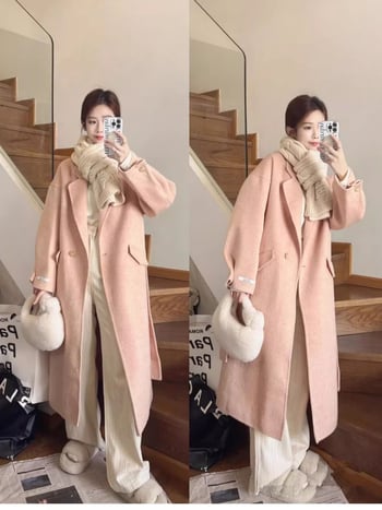 Ženski vuneni kaput, srednje duljine, opuštenog kroja, dvostruko kopčanje, ovratnik stila sakoa, dugi rukavi, ručno šiveno