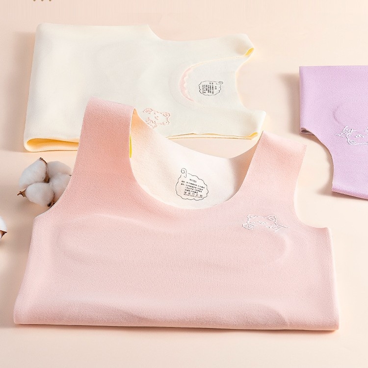 Termalni prsluk za djevojčice 7–12 godina, dvostruki sloj od poliester materijala, samozagrijavanje, s fiksnim jastučićima za prsni koš