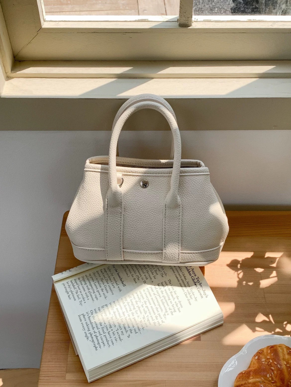 Ženska crossbody torbica u urbanom minimalističkom stilu od PU kože, magnetno zatvaranje i džep za telefon