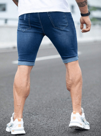 Férfi denim nadrág, középmagas derékkal, egyenes szabás, térd alatti hosszúságú, kopott, szakadt szegélyek, kőmosott, 69% pamut