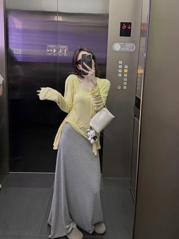 Duga asimetrična suknja sa stražnjim prorezom, četkani materijal, mješavina pamuka i poliestera, mikro-elastičnost, elegantan stil